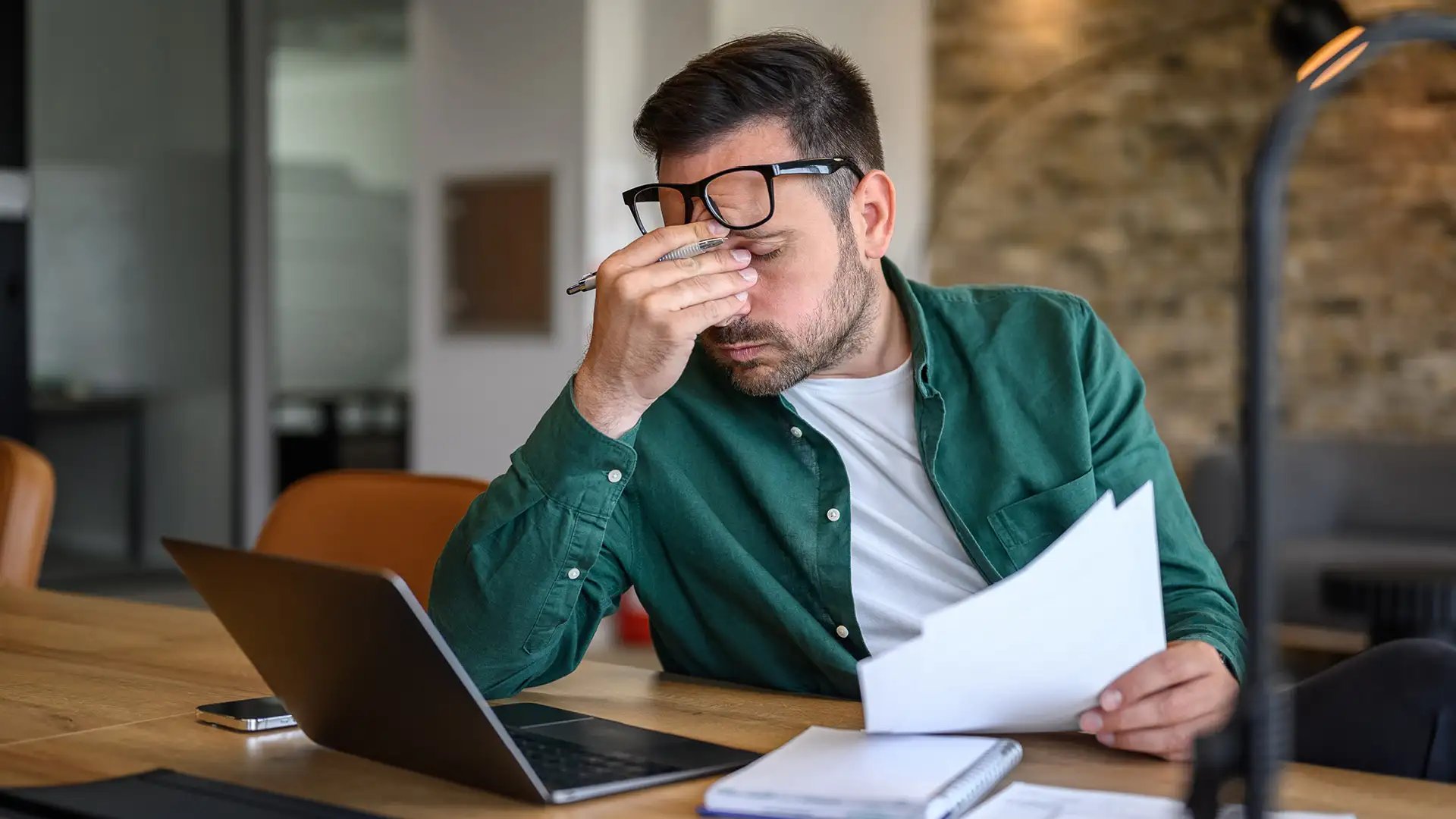 Tired person working