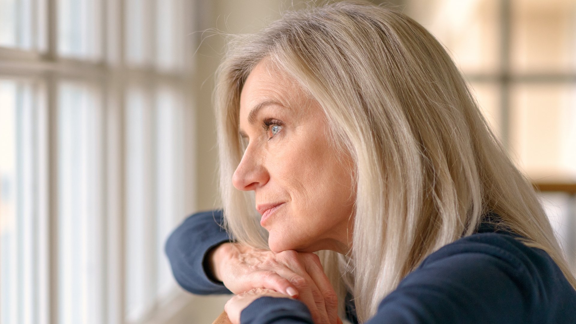 Older woman reflecting