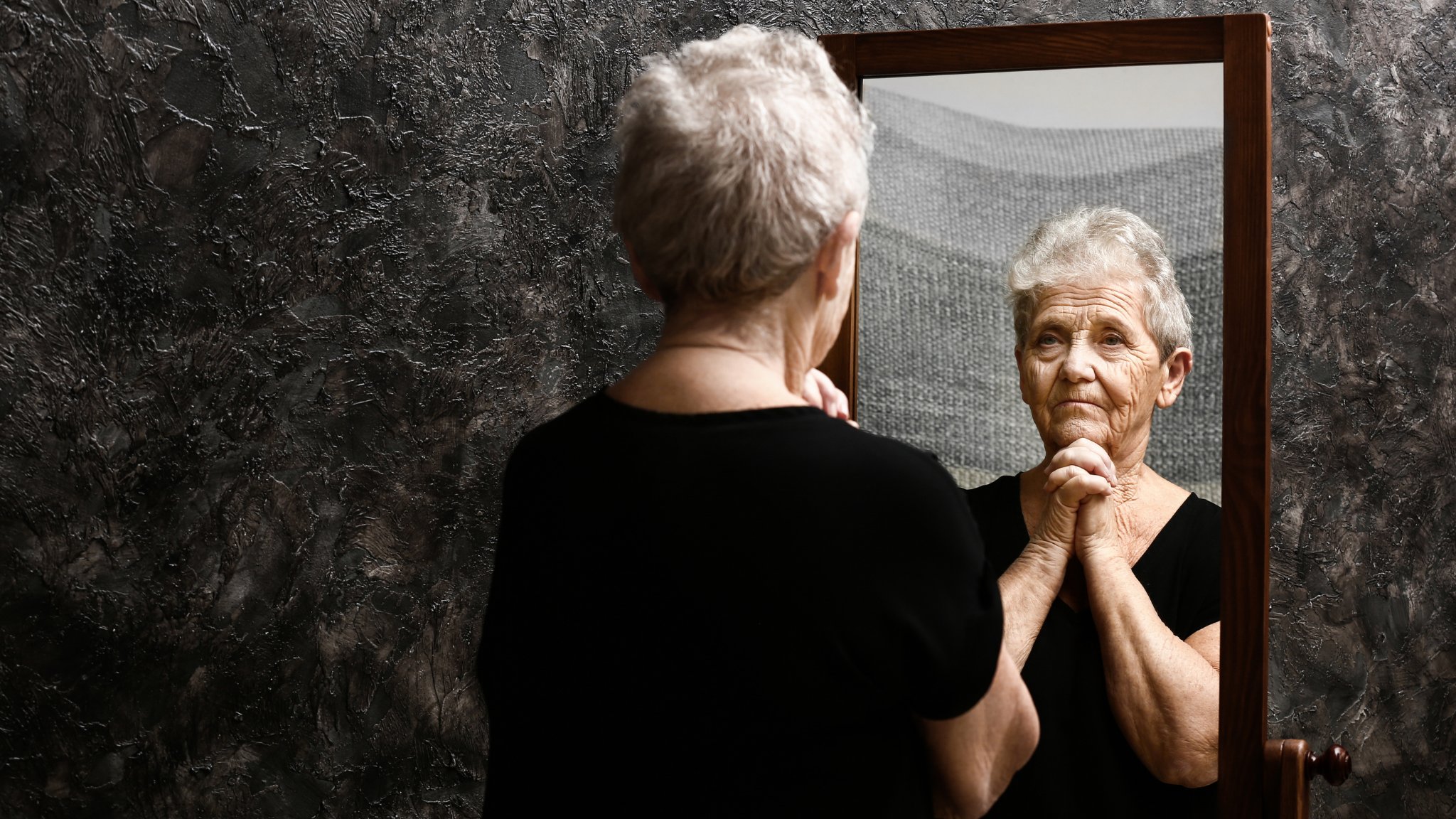 Older woman reflection