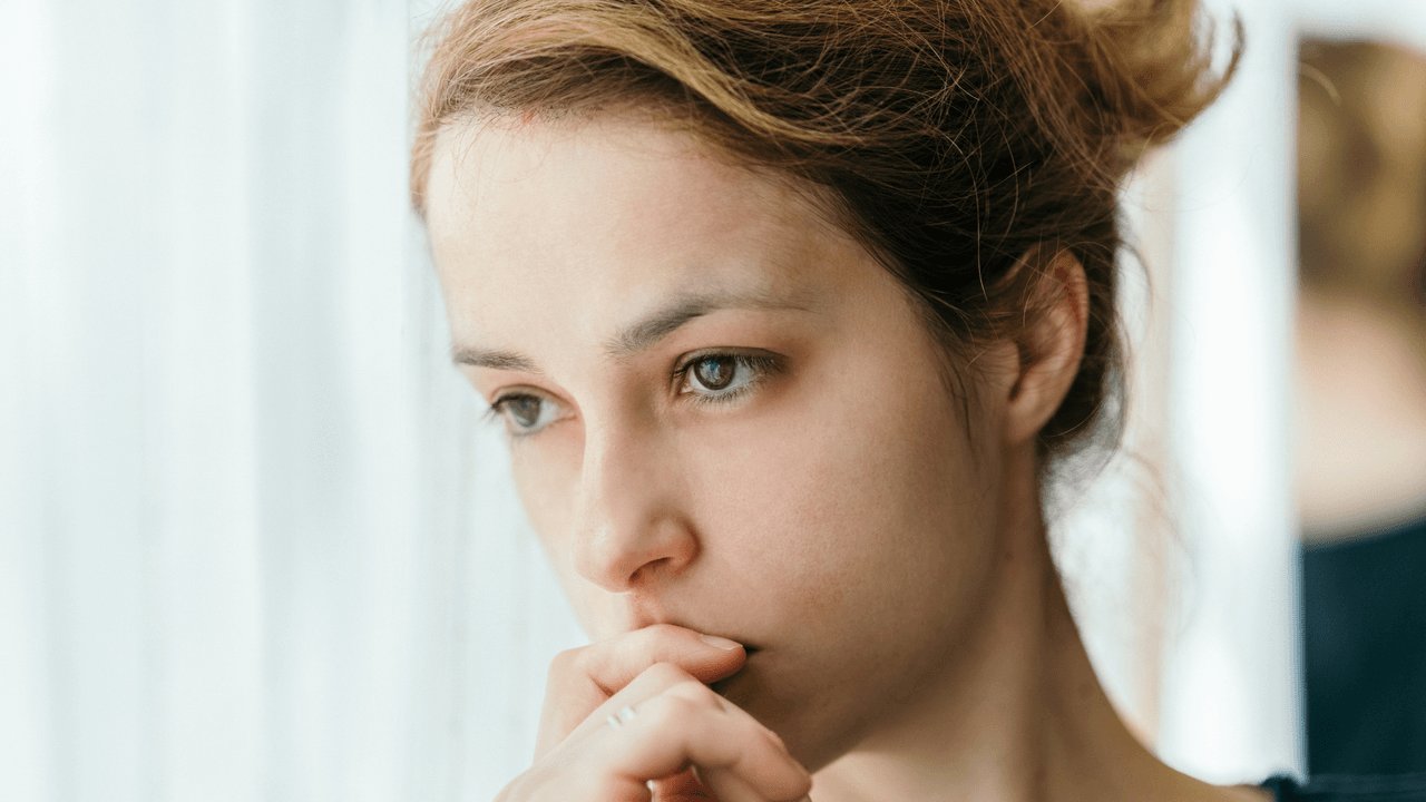 Quiet woman thinking